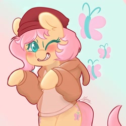 Size: 2500x2500 | Tagged: safe, artist:lynuscattips, fluttershy, butterfly, pegasus, pony, g4, bipedal, blushing, clothes, female, hat, high res, hoodie, looking at you, one eye closed, signature, solo, wink, winking at you