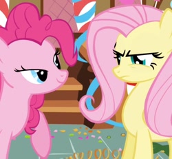 Size: 914x845 | Tagged: safe, screencap, fluttershy, pinkie pie, earth pony, pegasus, pony, g4, griffon the brush off, my little pony: friendship is magic, season 1, angry, cropped, duo, duo female, female, fluttershy is not amused, frown, lidded eyes, mare, out of context, smiling, unamused