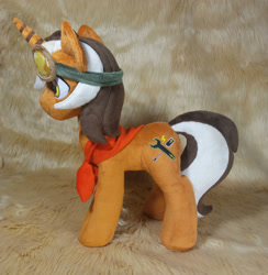 Size: 3120x3196 | Tagged: safe, artist:doctorkoda, oc, oc only, pony, unicorn, clothes, commission, goggles, high res, horn, irl, male, photo, plushie, scarf, smiling, solo, stallion, standing