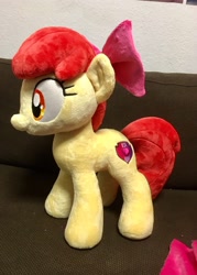 Size: 1464x2048 | Tagged: safe, artist:rtryart, apple bloom, earth pony, pony, g4, apple bloom's bow, bow, female, filly, foal, hair bow, happy, irl, photo, plushie, smiling, solo, standing