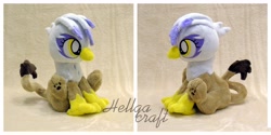 Size: 4096x2043 | Tagged: safe, artist:hellgacraft, gilda, griffon, g4, beak, female, irl, leonine tail, paw pads, paws, photo, plushie, sitting, solo, tail, talons, younger