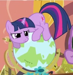 Size: 351x364 | Tagged: safe, screencap, twilight sparkle, pony, unicorn, g4, secret of my excess, behaving like a cat, globe, golden oaks library, indoors, solo, stare, tennis racket, twilight cat, unicorn twilight