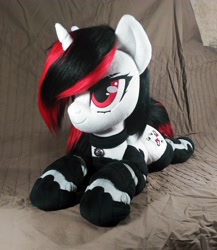 Size: 2946x3394 | Tagged: safe, artist:doctorkoda, oc, oc only, oc:blackjack, pony, unicorn, fallout equestria, fallout equestria: project horizons, bell, bell collar, collar, female, high res, horn, irl, lying down, photo, plushie, prone, solo