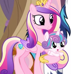 Size: 1543x1619 | Tagged: safe, screencap, princess cadance, princess flurry heart, shining armor, alicorn, pony, g4, once upon a zeppelin, airship, baby, baby pony, big eyes, colored wings, concave belly, cropped, crown, cute, female, filly, flurrybetes, foal, folded wings, gradient wings, jewelry, mother and child, mother and daughter, peytral, regalia, slender, thin, wings, zeppelin