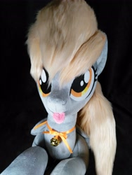 Size: 3072x4096 | Tagged: safe, artist:doctorkoda, derpy hooves, pegasus, pony, g4, :p, female, folded wings, irl, lying down, mare, photo, plushie, prone, solo, tongue out, wings
