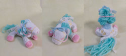 Size: 1280x573 | Tagged: safe, artist:starfulstitches, oc, earth pony, pony, female, irl, lying down, mare, photo, plushie, prone, sitting, solo