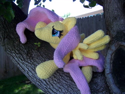 Size: 3264x2448 | Tagged: safe, artist:starfulstitches, fluttershy, pegasus, pony, g4, female, high res, irl, lying down, mare, photo, plushie, prone, solo, spread wings, wings