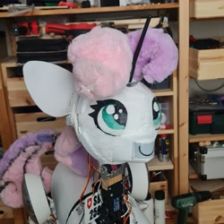 Size: 2992x2992 | Tagged: safe, artist:sweetie bot 2560, derpibooru exclusive, sweetie belle, oc, oc only, oc:sweetie bot 2560, pony, robot, robot pony, unicorn, g4, 3d print, assembly, disassembly, e-ink, e-paper, electronics, gazing, gears, high res, irl, license plate, maintenance, partial disassembly, photo, robot gore, servo, smiling, solo, sweetie bot, switzerland, upgrade, wires
