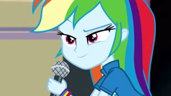 Size: 3072x1727 | Tagged: safe, screencap, rainbow dash, human, equestria girls, g4, my little pony equestria girls: friendship games, chs rally song, clothes, cutie mark on clothes, dreamworks face, eyebrows, female, microphone, raised eyebrow, smiling, solo