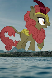 Size: 3072x4608 | Tagged: safe, anonymous editor, artist:cloudy glow, edit, maple brown, kirin, g4, background kirin, cloven hooves, female, giant kirin, giantess, grin, high res, highrise ponies, irl, macro, mountain, mountain range, photo, ponies in real life, raised hoof, smiling, solo