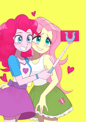 Size: 2894x4093 | Tagged: safe, artist:haibaratomoe, fluttershy, pinkie pie, human, equestria girls, g4, bare shoulders, belt, blushing, breasts, cellphone, cleavage, clothes, cute, diapinkes, duo, duo female, female, grin, heart, lesbian, phone, selfie, selfie stick, ship:flutterpie, shipping, shirt, shyabetes, simple background, skirt, sleeveless, sleeveless shirt, smartphone, smiling, tank top, touching arm, yellow background