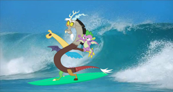 Size: 1172x625 | Tagged: safe, editor:incredibubbleirishguy, clear sky, discord, spike, draconequus, dragon, blue, duo, duo male, male, ocean, real life background, summer, surfboard, surfing, water, wave, winged spike, wings