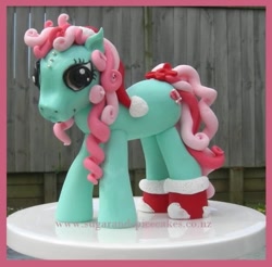 Size: 570x560 | Tagged: safe, minty, earth pony, pony, g3, bow, cake, christmas, clothes, curly hair, etsy, fondant, food, hat, holiday, irl, new zealand, pearl, photo, santa hat, socks, solo, tail, tail bow, watermark, website