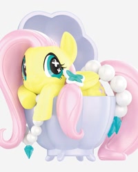 Size: 1080x1350 | Tagged: safe, fluttershy, butterfly, pegasus, pony, g4, cup, cute, diamond, female, jewelry, mare, merchandise, necklace, pink mane, pink tail, shyabetes, tail, teacup, toy, wings, yellow coat