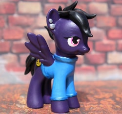 Size: 4051x3806 | Tagged: safe, artist:mistyquest, oc, pegasus, pony, adoptable, alt style, alternative, black hair, black mane, black tail, blue clothes, clothed ponies, clothes, commission, craft, customized toy, ear piercing, earring, emo, female, figure, figurine, for sale, gender neutral, goth, irl, jewelry, lidded eyes, mare, photo, piercing, pink eyes, punk, purple coat, purple fur, shirt, short hair, short mane, short tail, silver, smiley face, solo, straight face, sweater, tail, tired, toy
