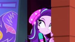 Size: 3072x1727 | Tagged: safe, screencap, starlight glimmer, human, equestria girls, equestria girls specials, g4, my little pony equestria girls: mirror magic, beanie, breasts, canterlot mall, cinema, female, frown, hat, solo