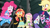 Size: 1280x720 | Tagged: safe, screencap, applejack, fluttershy, pinkie pie, rarity, sci-twi, spike, spike the regular dog, sunset shimmer, twilight sparkle, dog, human, equestria girls, equestria girls specials, g4, my little pony equestria girls: movie magic, belt, boots, bowtie, bracelet, clapboard, clothes, cowboy hat, freckles, glasses, hat, high heel boots, jacket, jewelry, leather jacket, open mouth, polish, ponytail, scared, shock, shoes, skirt, split screen, stetson, two sides