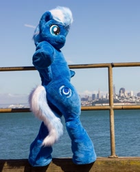 Size: 834x1024 | Tagged: safe, artist:atalonthedeer, night glider, g4, 2018, butt, city, cityscape, fursuit, hoofbump, irl, looking at you, looking back, looking back at you, new york, ocean, photo, ponysuit, solo, tail, water, wide hips