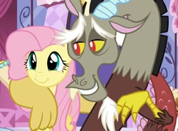 Size: 1456x1072 | Tagged: safe, screencap, discord, fluttershy, draconequus, pegasus, pony, g4, season 5, what about discord?, arm around neck, carousel boutique, cropped, cute, discute, duo, duo male and female, female, grin, logo, male, mannequin, mare, shyabetes, smiling