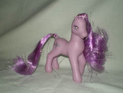 Size: 640x480 | Tagged: safe, photographer:lancer, buttercup (g2), earth pony, pony, g2, detachable tail, irl, new hair feature pony, photo, solo, tinsel in mane, toy