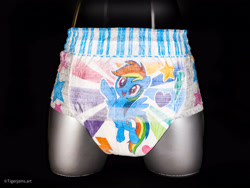 Size: 4000x3000 | Tagged: safe, rainbow dash, pegasus, pony, g4, black background, diaper, heart, irl, lightning, merchandise, pampers, pampers easy ups, photo, pullup (diaper), simple background, solo, stars