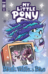 Size: 2063x3131 | Tagged: safe, artist:shauna j. grant, idw, official comic, misty brightdawn, skye, violette rainbow, pony, unicorn, zebra, g5, official, spoiler:comic, spoiler:g5comic, abstract background, black white & blue, braces, coat markings, comic cover, female, filly, foal, freckles, gem, gritted teeth, happy, high res, mare, my little pony logo, pale belly, pinto, socks (coat markings), sparkles, teeth, television, trio, trio female, vitiligo