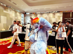 Size: 4032x3024 | Tagged: safe, derpibooru exclusive, rainbow dash, human, pegasus, g4, convention, csbc 2023, fursuit, irl, irl human, photo, ponysuit