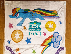 Size: 3000x4000 | Tagged: safe, rainbow dash, pegasus, pony, g4, diaper, flying, irl, lightning, merchandise, pampers, pampers easy ups, photo, pullup (diaper), rainbow dash's cutie mark, rainbow trail, simple background, solo, stars