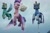 Size: 1709x1143 | Tagged: safe, screencap, cloudpuff, queen haven, thunder flap, zoom zephyrwing, dog, flying pomeranian, pegasus, pomeranian, pony, g5, my little pony: make your mark, animation error, crown, female, flying, group, guardsmare, helmet, jewelry, male, mare, missing accessory, necklace, pegasus royal guard, regalia, royal guard, stallion, unamused, winged dog, zoom zephyrwing is not amused