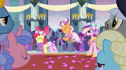 Size: 2160x1195 | Tagged: safe, screencap, apple bloom, princess cadance, queen chrysalis, scootaloo, alicorn, earth pony, pegasus, pony, unicorn, a canterlot wedding, g4, background pony, bride, canterlot, canterlot castle, clothes, cute, dress, evil smile, eyes closed, fake cadance, floral head wreath, flower, flower filly, flower girl, flower girl dress, flower in hair, force field, grin, hopping, marriage, necktie, open mouth, smiling, wedding, wedding veil