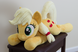 Size: 4178x2786 | Tagged: safe, artist:azgchip, applejack, earth pony, pony, g4, cute, female, freckles, hatless, irl, lying down, mare, missing accessory, photo, plushie, prone, solo, sploot