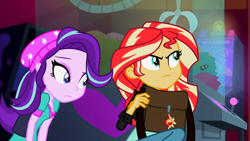 Size: 3072x1727 | Tagged: safe, screencap, starlight glimmer, sunset shimmer, human, equestria girls, equestria girls specials, g4, my little pony equestria girls: mirror magic, beanie, canterlot mall, cinema, clothes, duo, duo female, female, frown, hat, jacket, leather, leather jacket