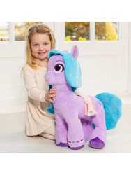 Size: 600x800 | Tagged: safe, izzy moonbow, human, pony, unicorn, g5, irl, irl human, photo, plushie, target demographic