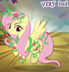 Size: 660x691 | Tagged: safe, gameloft, idw, fluttershy, pegasus, pony, g4, my little pony: magic princess, bad, cropped, english, female, flower, idw showified, mare, meme, poison ivyshy, solo, spread wings, text, vine, wings, wow! glimmer