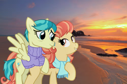 Size: 1280x853 | Tagged: safe, artist:cheezedoodle96, edit, editor:jaredking779, aunt holiday, auntie lofty, earth pony, pegasus, pony, g4, beach, clothes, duo, female, hoof on chest, irl, island, lesbian, mare, photo, ponies in real life, scarf, spread wings, sunset, sweater, wings