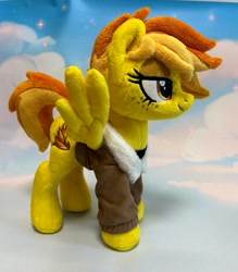 Size: 1120x1280 | Tagged: safe, artist:ketika, spitfire, pony, g4, bomber jacket, clothes, cloud, freckles, irl, jacket, lidded eyes, photo, plushie, short mane, short tail, solo, spread wings, standing, tail, wings