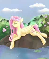 Size: 1000x1200 | Tagged: safe, artist:uberponya, fluttershy, pegasus, pony, g4, chest fluff, eyes closed, female, floppy ears, floral head wreath, flower, folded wings, lilypad, lying down, mare, outdoors, pond, smiling, solo, water, wings