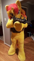 Size: 540x960 | Tagged: safe, artist:atalonthedeer, sunset shimmer, human, unicorn, g4, 2016, aiming, ar-15, bulletproof vest, clothes, cosplay, costume, delet this, fursuit, gun, irl, irl human, magpul, photo, pony costume, ponysuit, rifle, smiling, smirk, weapon