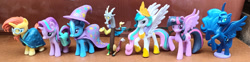 Size: 1280x316 | Tagged: safe, artist:dingopatagonico, discord, princess celestia, princess luna, starlight glimmer, sunburst, trixie, twilight sparkle, alicorn, pony, unicorn, g4, photo, toy, twilight sparkle (alicorn)