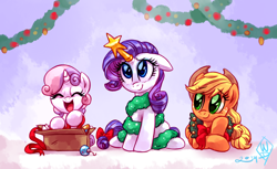 Size: 2000x1225 | Tagged: safe, artist:whitediamonds, applejack, rarity, sweetie belle, earth pony, pony, unicorn, rarijack daily, g4, applejack's hat, belle sisters, box, christmas, christmas ornament, cowboy hat, cute, decoration, diasweetes, eyebrows, eyebrows visible through hair, eyes closed, female, filly, floppy ears, foal, freckles, hat, holiday, horn, lesbian, looking at someone, lying down, mare, open mouth, prone, ship:rarijack, shipping, siblings, signature, sisters, sitting, smiling, trio
