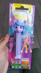 Size: 1125x2000 | Tagged: safe, izzy moonbow, pipp petals, sunny starscout, earth pony, pegasus, pony, unicorn, g5, food, irl, pez, pez dispenser, photo, singapore, toy