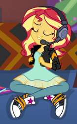 Size: 267x429 | Tagged: safe, screencap, sunset shimmer, human, equestria girls, g4, game stream, my little pony equestria girls: better together, clothes, couch, cropped, dress, gamer sunset, headphones, jacket, leather, leather jacket, pants, solo, sunset's apartment, trainers