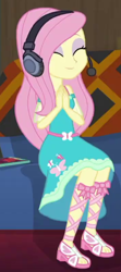 Size: 236x532 | Tagged: safe, screencap, fluttershy, human, equestria girls, g4, game stream, my little pony equestria girls: better together, clothes, couch, cropped, cute, dress, eyeshadow, fluttershy boho dress, gamer fluttershy, headphones, makeup, pink eyeshadow, shyabetes, smiling, solo, sunset's apartment