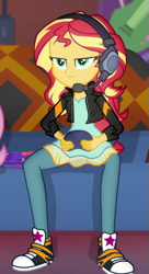 Size: 283x522 | Tagged: safe, screencap, sunset shimmer, human, equestria girls, g4, game stream, my little pony equestria girls: better together, clothes, controller, couch, cropped, dress, gamer sunset, headphones, jacket, leather, leather jacket, pants, solo, sunset's apartment, trainers