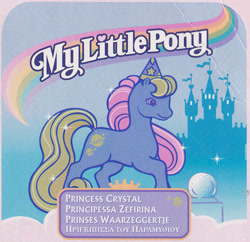 Size: 575x557 | Tagged: safe, princess crystal, earth pony, pony, g2, official, backcard, castle, cloud, crystal ball, dutch, female, greek, hat, italian, mare, my little pony logo, name, rainbow, raised hoof, smiling, solo, sparkles, text, translated in the comments, wizard hat