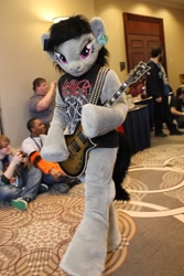Size: 853x1280 | Tagged: dead source, safe, artist:atalonthedeer, octavia melody, earth pony, human, pony, anthro, g4, 2015, bedroom eyes, clothes, convention, ear tag, electric guitar, fursuit, guitar, irl, irl human, les paul, looking at you, metalhead, musical instrument, photo, ponysuit, shirt, slayer, solo, strap