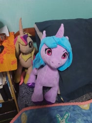 Size: 3000x4000 | Tagged: safe, izzy moonbow, princess cadance, alicorn, pony, unicorn, g4, g5, bed, irl, photo, plushie, pony plushie, toy