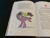 Size: 4032x3024 | Tagged: safe, spike, pegasus, pony, g4, my little pony. poni nimeltä spike, book, cutie mark, finnish, irl, looking at butt, male, open book, photo, ponified, ponified spike, species swap, stallion, text