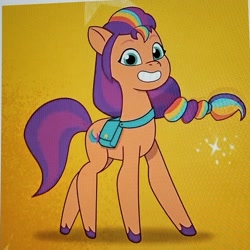 Size: 2018x2018 | Tagged: safe, screencap, sunny starscout, earth pony, pony, g5, my little pony: tell your tale, abstract background, bag, bean mouth, cute, hooves, looking at you, mane stripe sunny, photo, picture of a screen, saddle bag, slender, smiling, smiling at you, standing, sunny's bag, sunnybetes, thin, yellow background