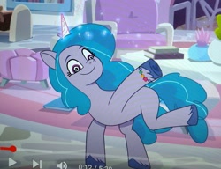 Size: 1935x1488 | Tagged: safe, screencap, izzy moonbow, pony, unicorn, firework-ing together, g5, my little pony: tell your tale, spoiler:g5, spoiler:my little pony: tell your tale, spoiler:tyts01e42, bracelet, couch, crystal brighthouse, cute, dizzy, dizzy izzy, dizzy moonbow, female, glowing, glowing horn, horn, izzybetes, jewelry, magic, magic glow, mare, photo, picture of a screen, raised leg, solo, swirly eyes, telekinesis, youtube
